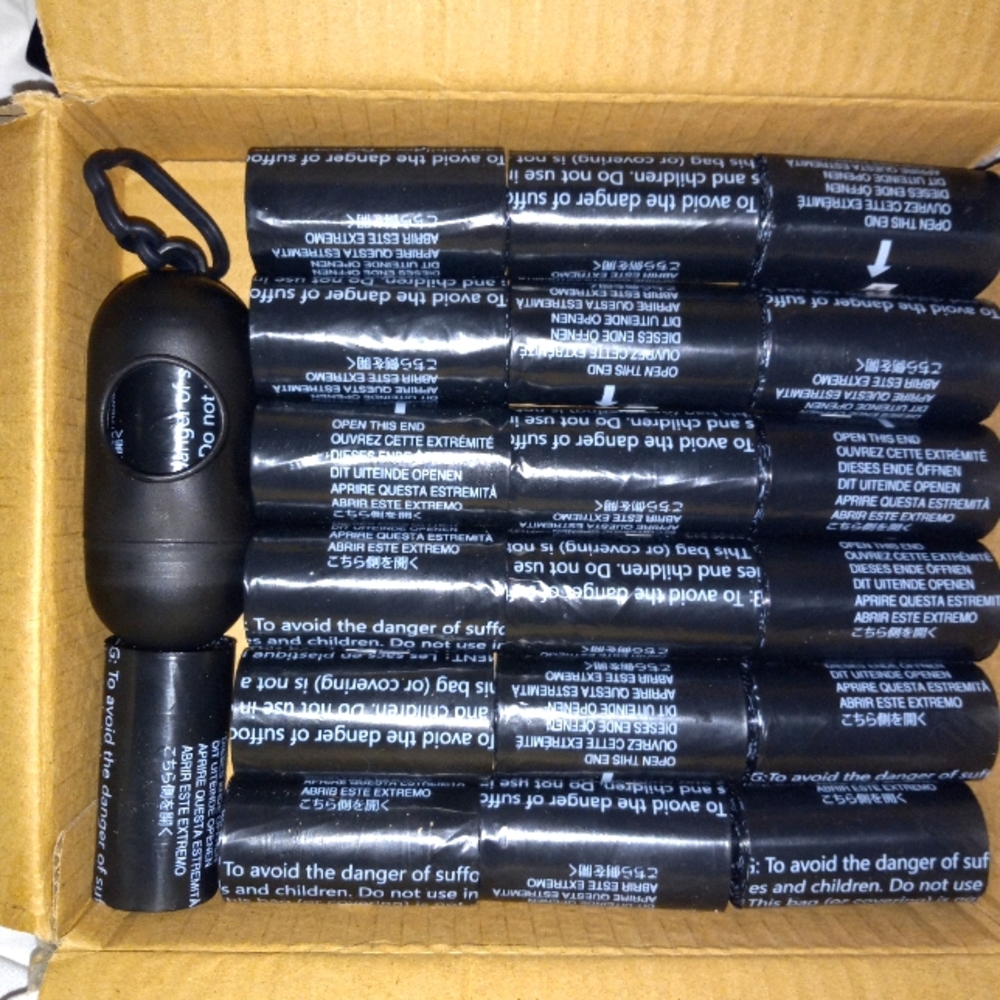 NIB 20 doggie poop baggies & leash dispenser